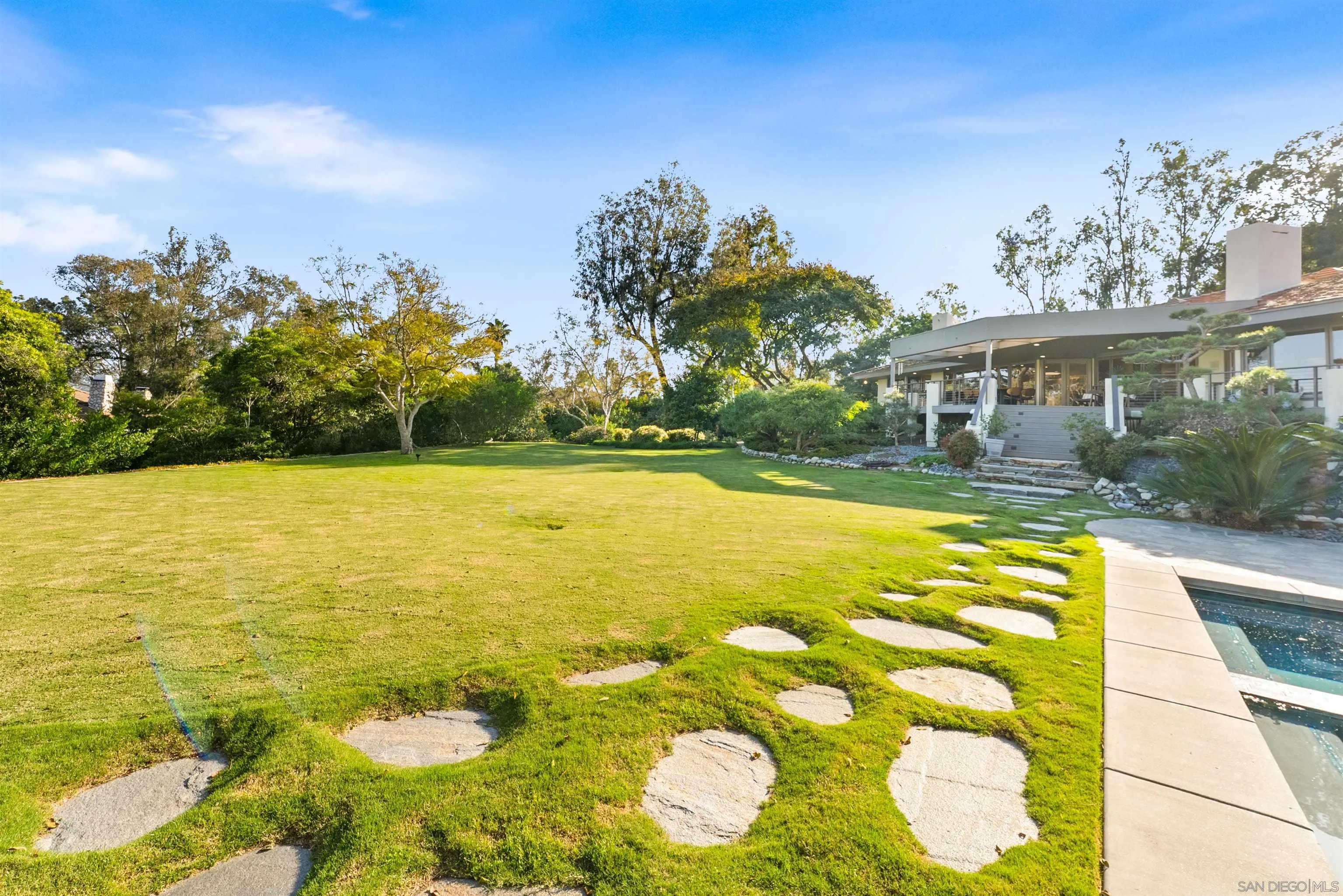 5491 Calzada Del Bosque Rancho Santa Fe, CA 92067 - Photo 57 of 69 a view of an house with swimming pool