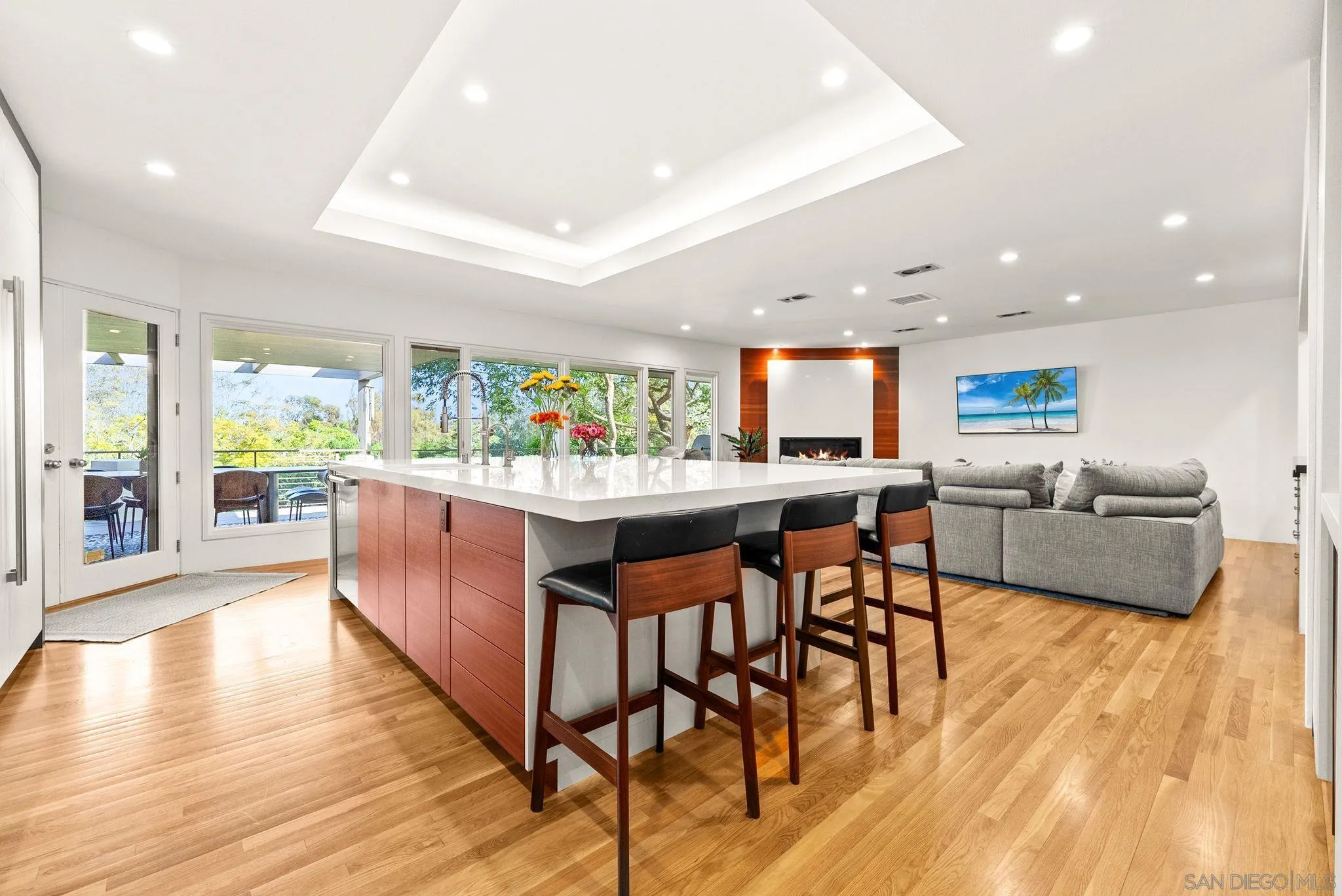 5491 Calzada Del Bosque Rancho Santa Fe, CA 92067 - Photo 67 of 69 Fire in the fireplace. Kitchen and family room areas are perfect for entertaining or relaxing. Gourmet kitchen!