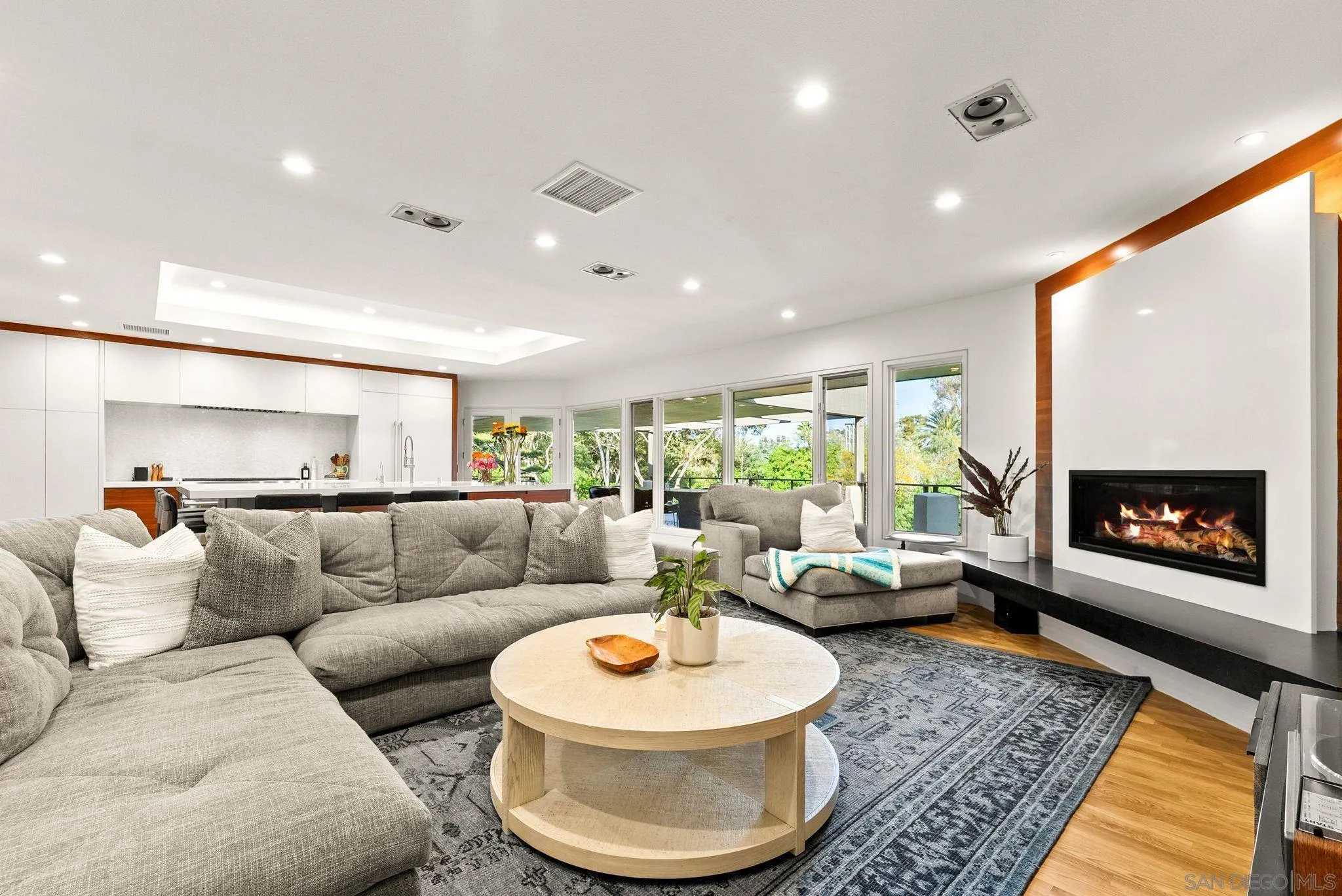 5491 Calzada Del Bosque Rancho Santa Fe, CA 92067 - Photo 68 of 69 a living room with furniture and a fireplace