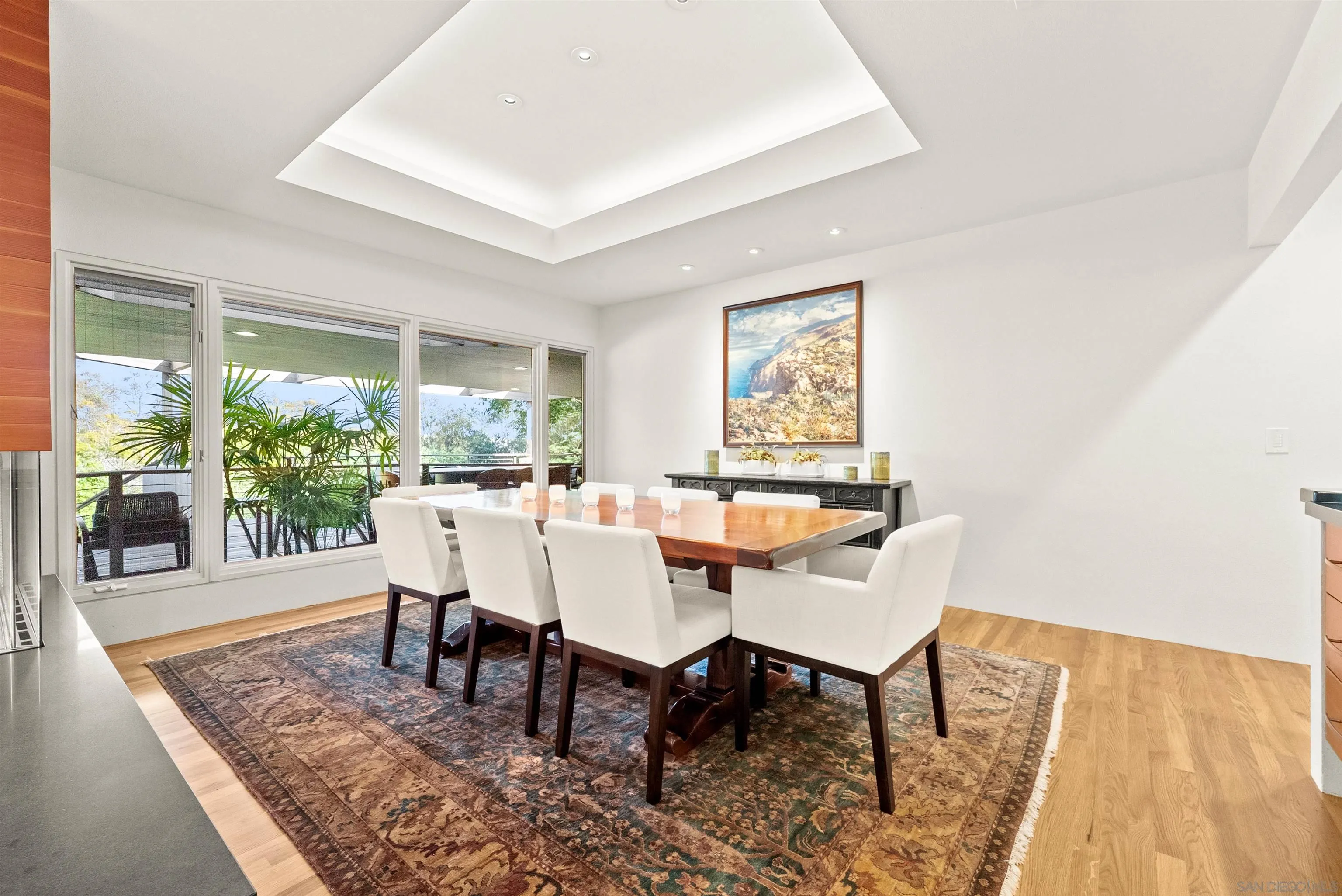 5491 Calzada Del Bosque Rancho Santa Fe, CA 92067 - Photo 8 of 69 a dining room with furniture wooden floor and a rug