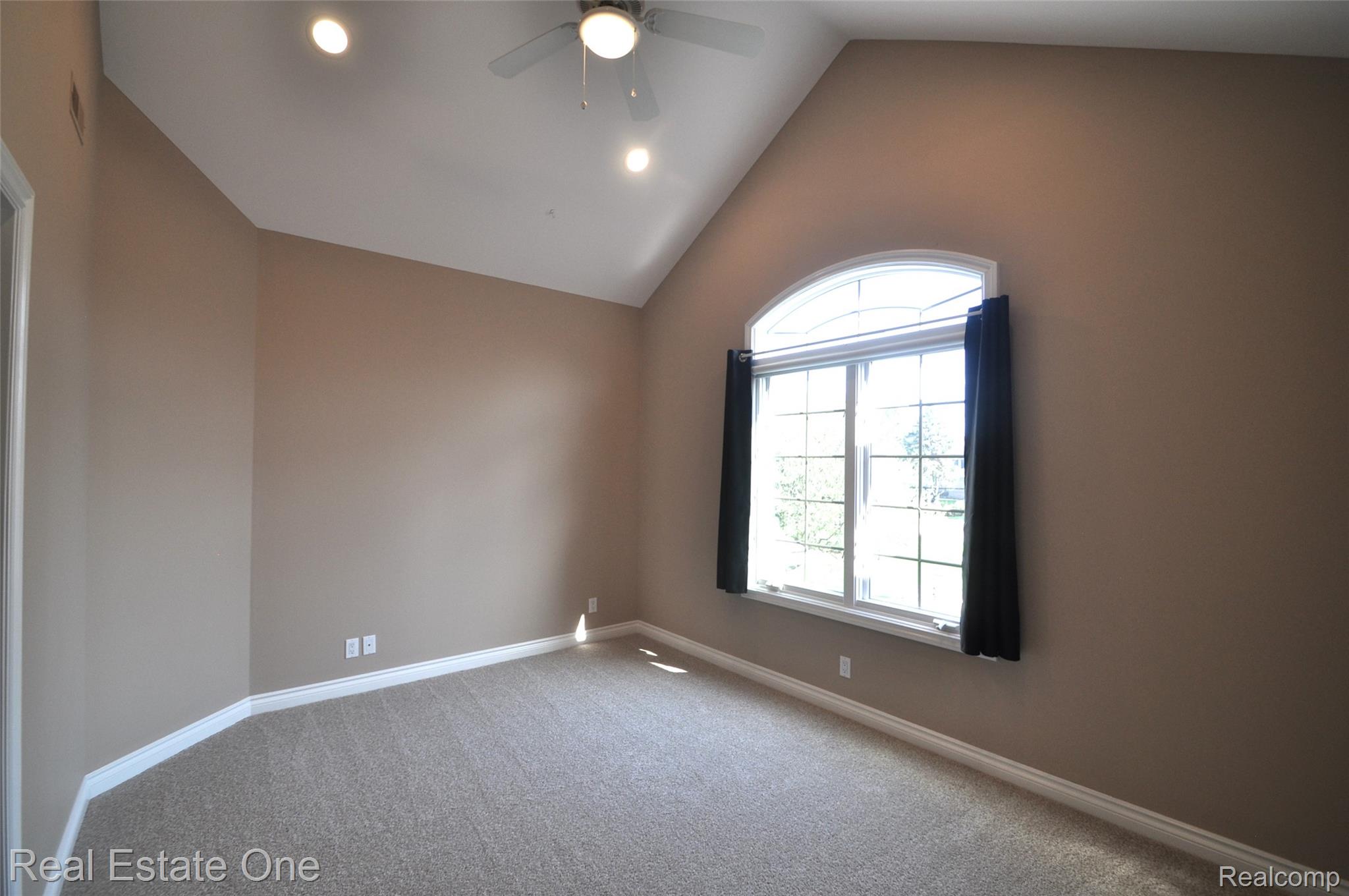 3648 West Tienken Road Rochester, MI 48306 - Photo 32 of 61 Vaulted Ceiling with Fan, Recessed Lighting and New Carpeting.