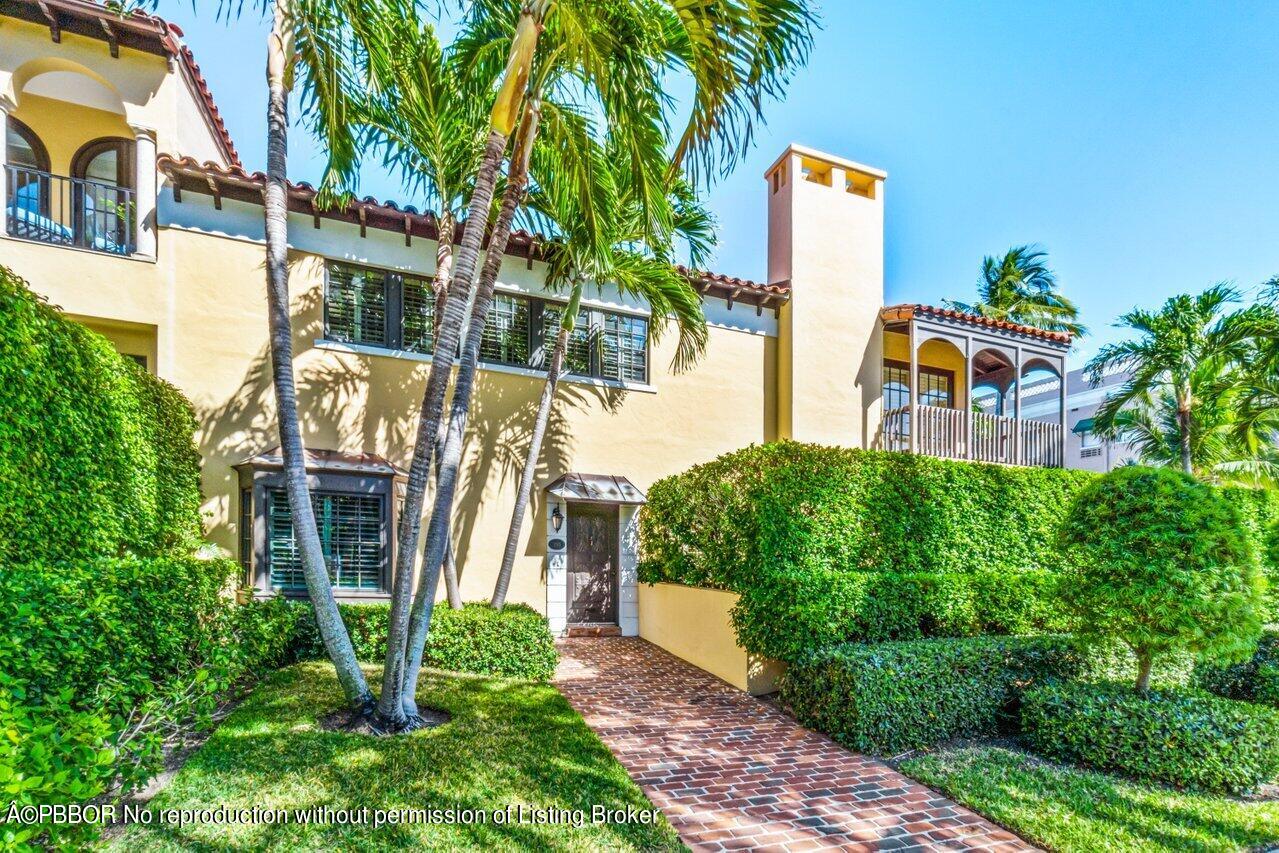 355 Cocoanut Row, Unit 2 Palm Beach, FL 33480 - Photo 2 of 26 a front view of a house with a yard