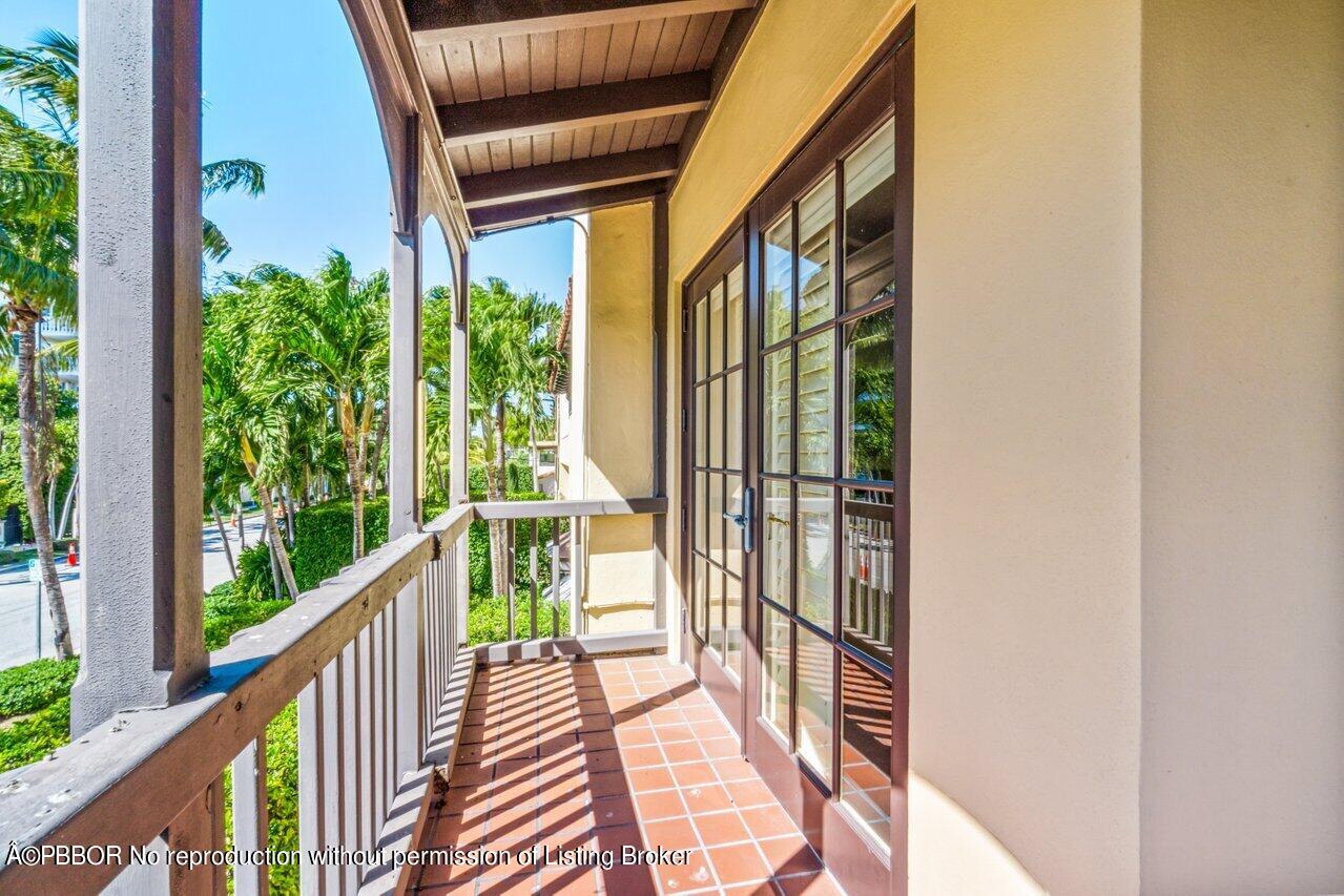 355 Cocoanut Row, Unit 2 Palm Beach, FL 33480 - Photo 25 of 26 a view of balcony with wooden floor
