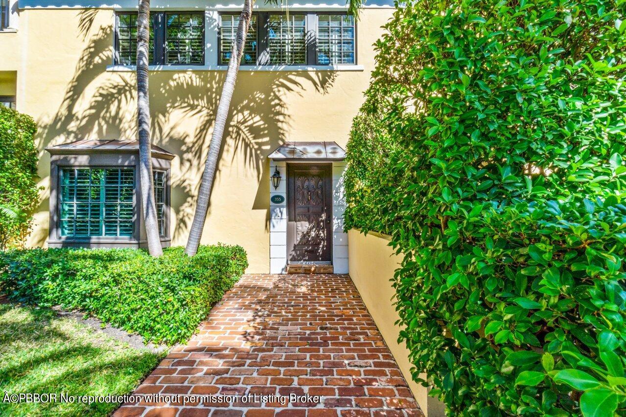 355 Cocoanut Row, Unit 2 Palm Beach, FL 33480 - Photo 3 of 26 front view of a house with a porch