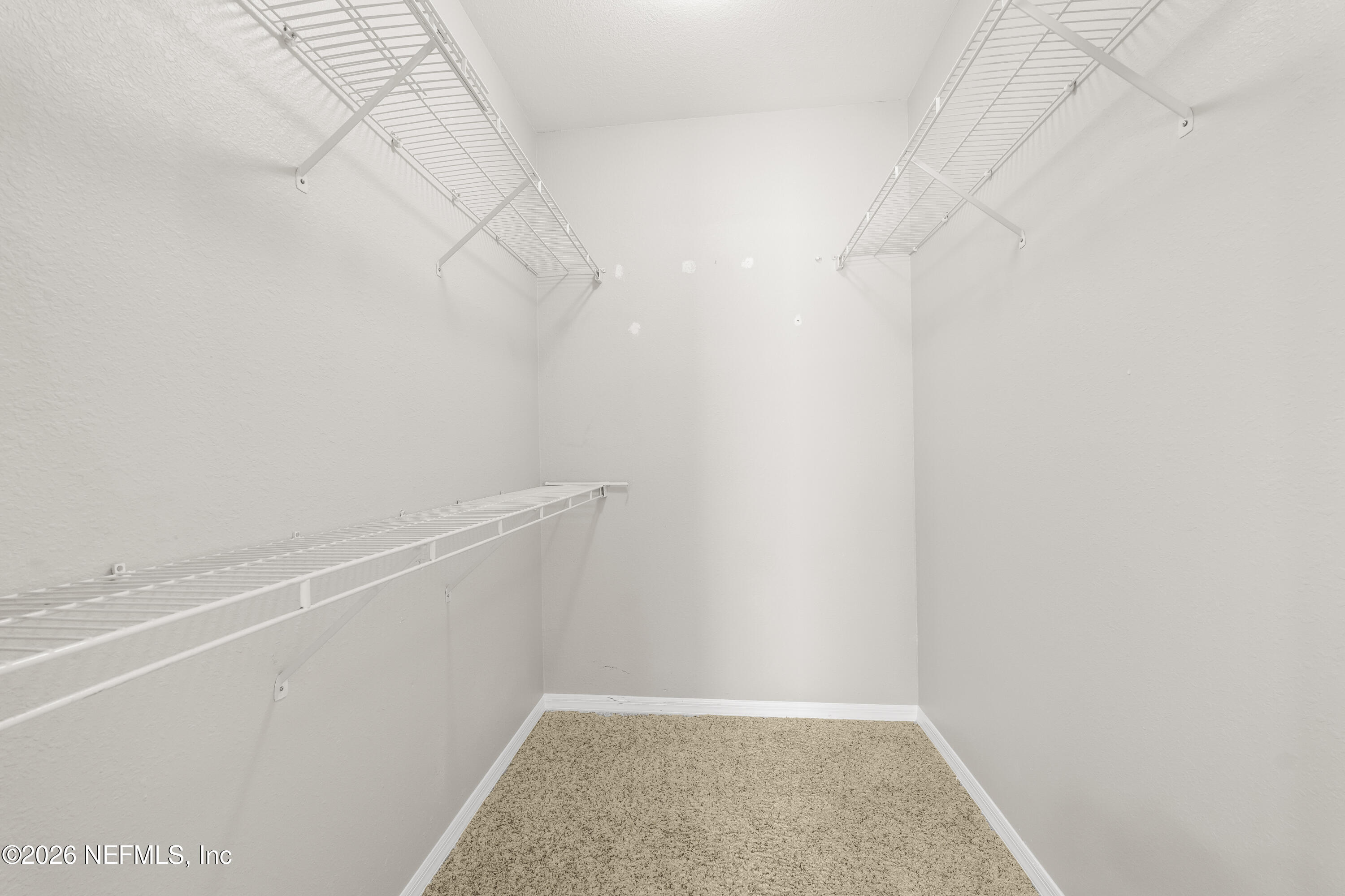 10961 Burnt Mill Road, Unit 1021 Jacksonville, FL 32256 - Photo 17 of 34 Walk-in Closet