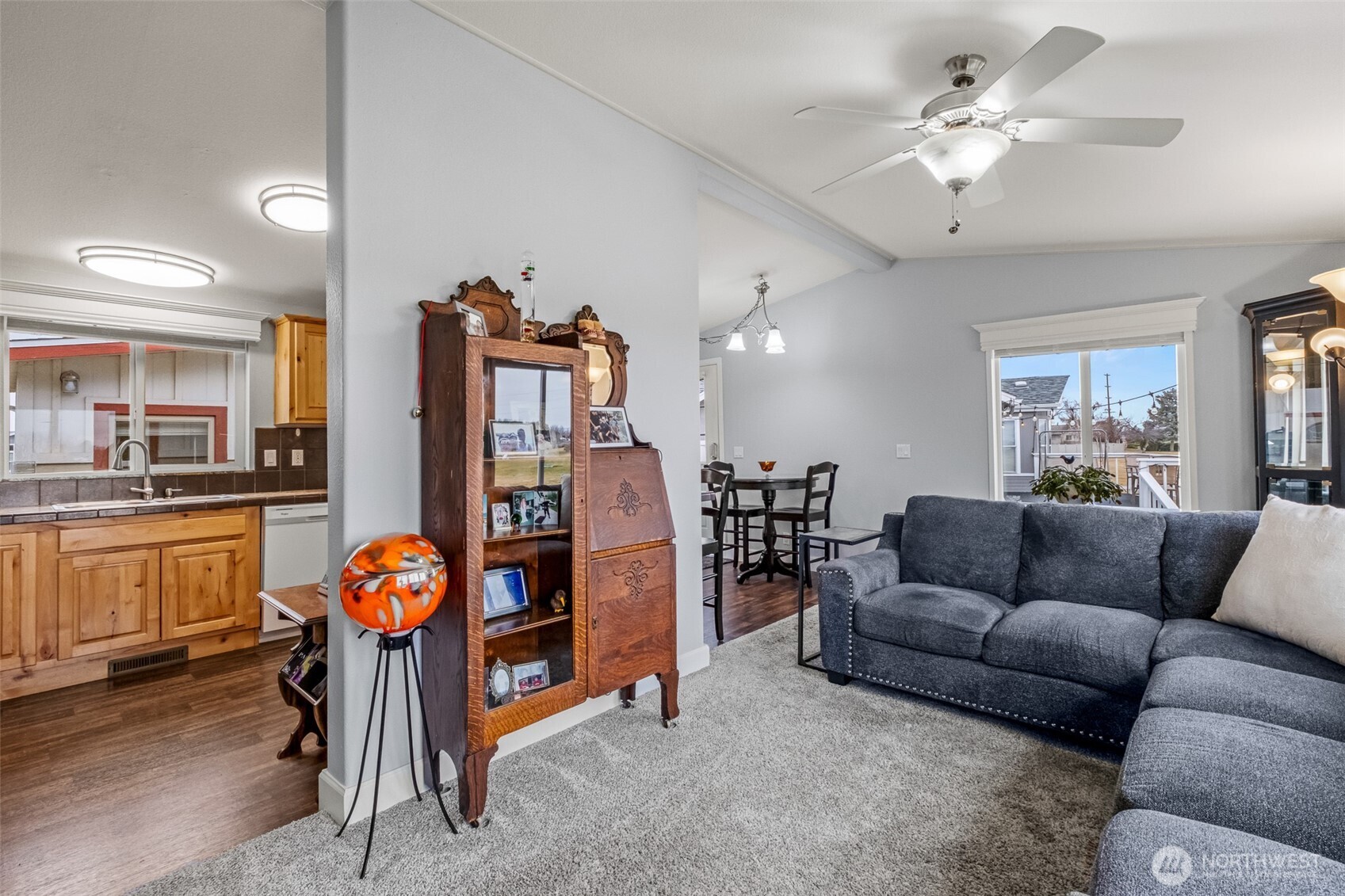 17693 Road 5 Northwest, Unit 52 Quincy, WA 98848 - Photo 11 of 25 a living room with furniture and kitchen view