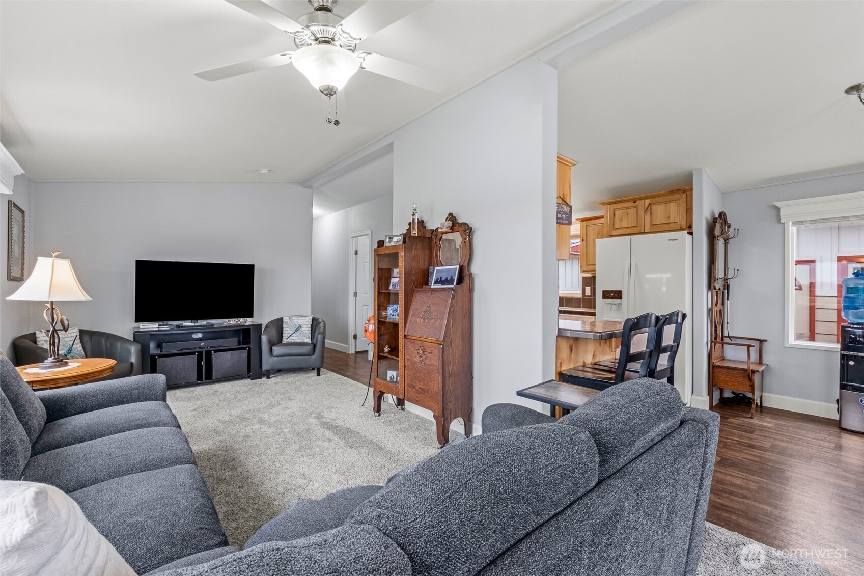 17693 Road 5 Northwest, Unit 52 Quincy, WA 98848 - Photo 14 of 25 a living room with furniture and a flat screen tv