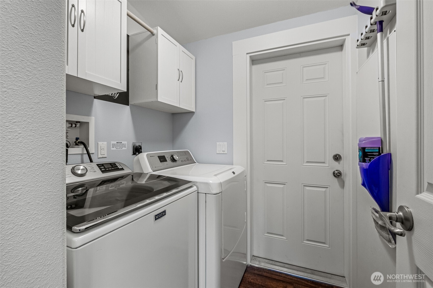 17693 Road 5 Northwest, Unit 52 Quincy, WA 98848 - Photo 21 of 25 a kitchen with white cabinets and white appliances