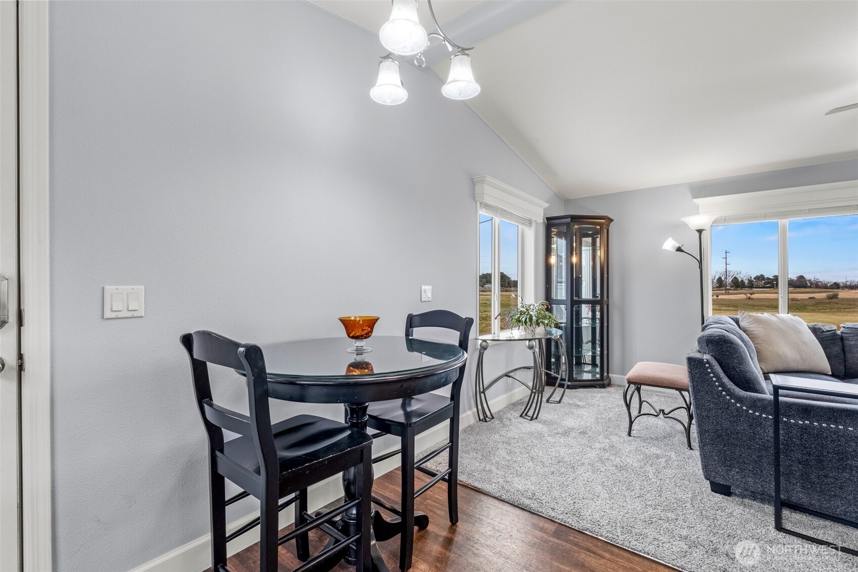17693 Road 5 Northwest, Unit 52 Quincy, WA 98848 - Photo 5 of 25 a view of a dining room with furniture and chandelier