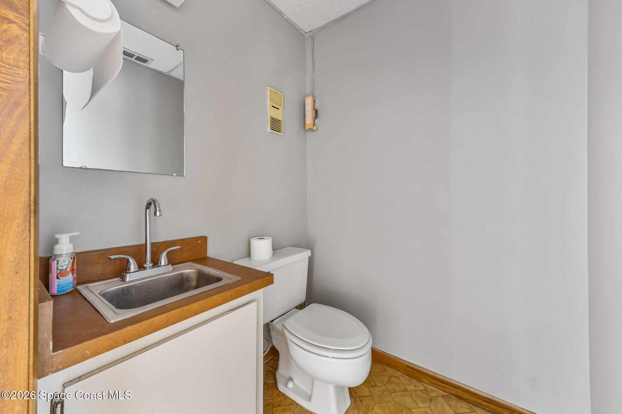 700 North Wickham Road, Unit 203 Melbourne, FL 32935 - Photo 13 of 15 Restroom
