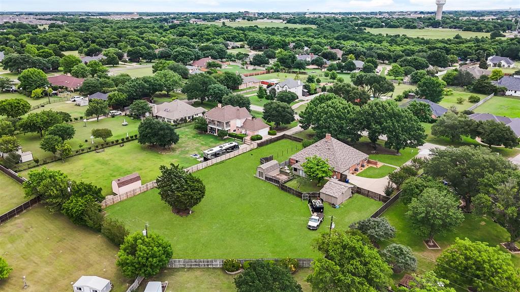 909 Valley View Avenue Red Oak, TX 75154 - Photo 36 of 37 an aerial view of residential house with outdoor space and trees all around