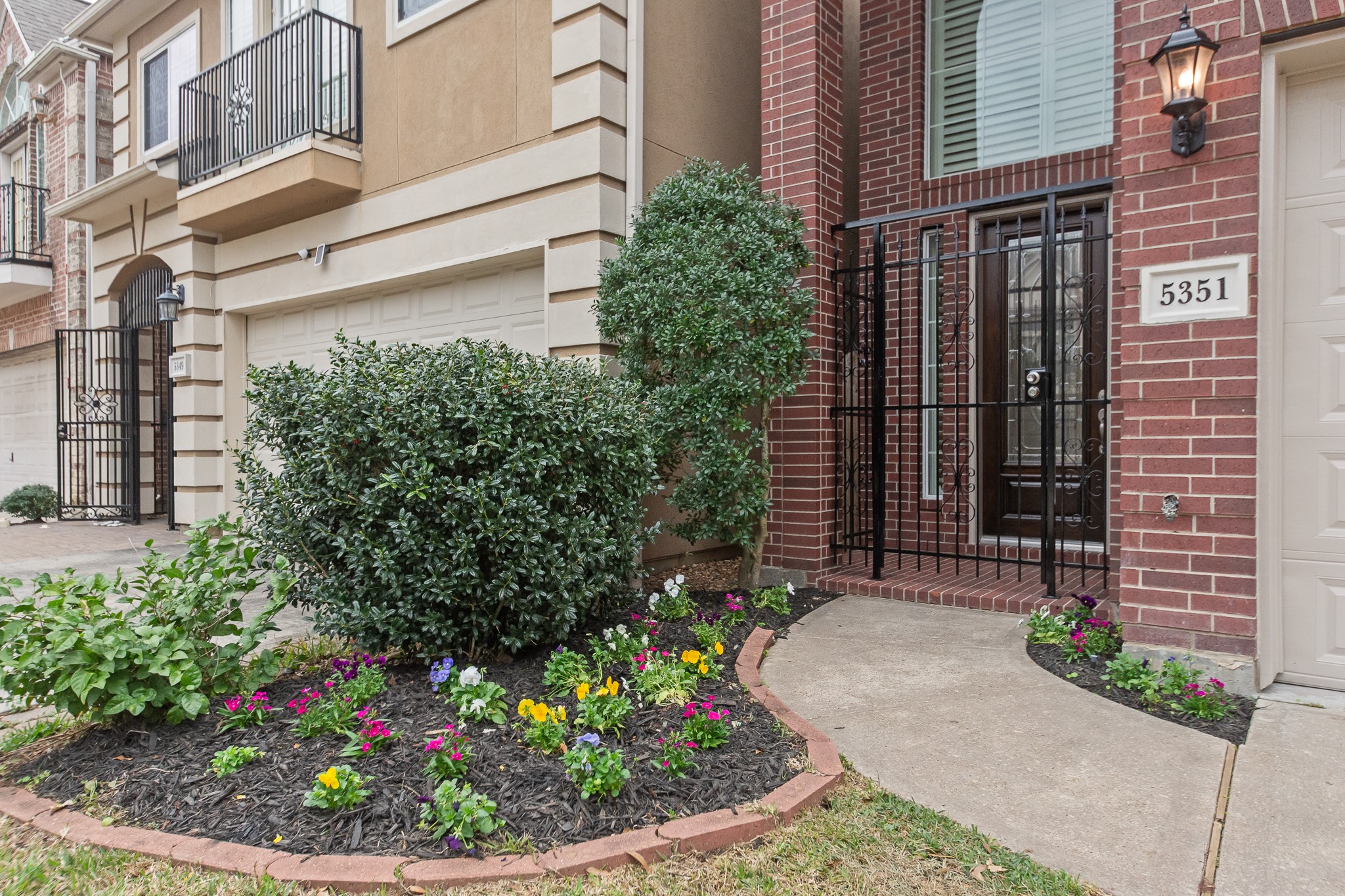 5351 McCulloch Circle Houston, TX 77056 - Photo 2 of 42 a view of a house with potted plants