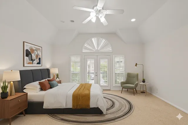 a bathroom with a glass shower door and a sink