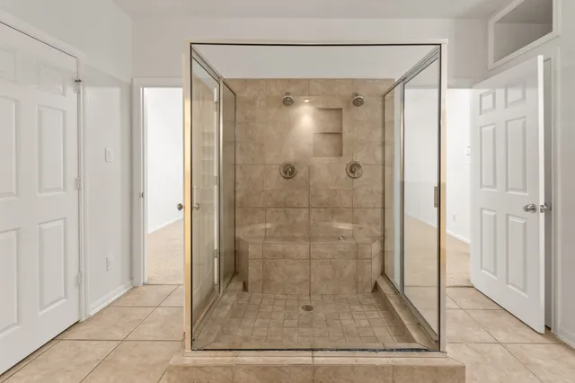 a view of an empty walk in closet