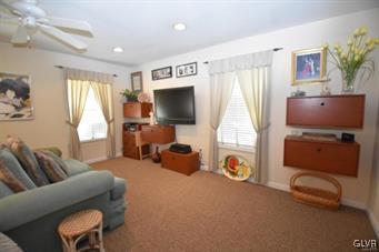 144 Indian Trail Road Jim Thorpe, PA 18229 - Photo 11 of 46 a living room with furniture and a flat screen tv