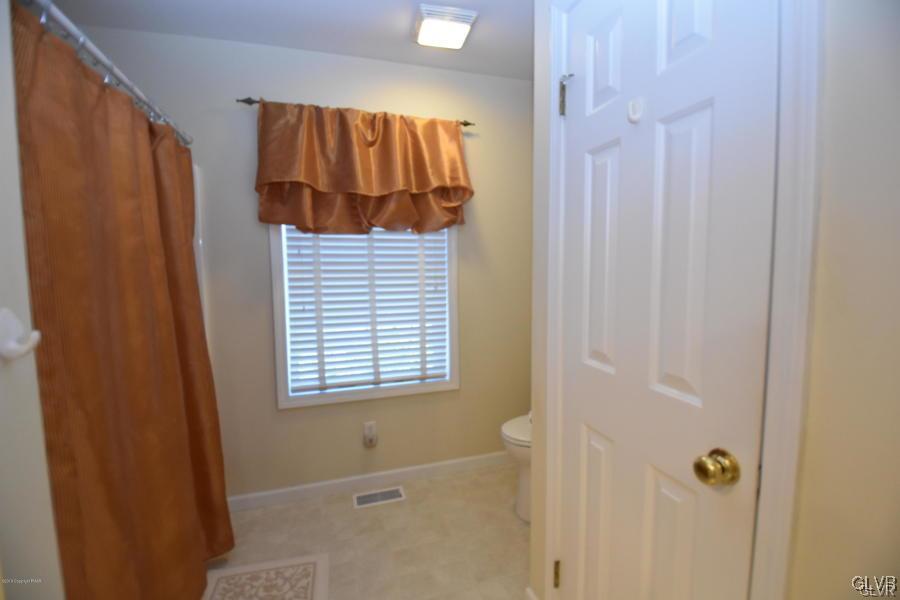 144 Indian Trail Road Jim Thorpe, PA 18229 - Photo 17 of 46 a bathroom with a shower and a window