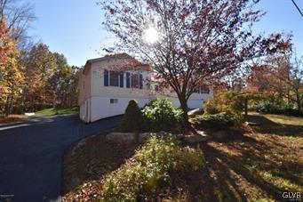 144 Indian Trail Road Jim Thorpe, PA 18229 - Photo 2 of 46 a house view with a tree