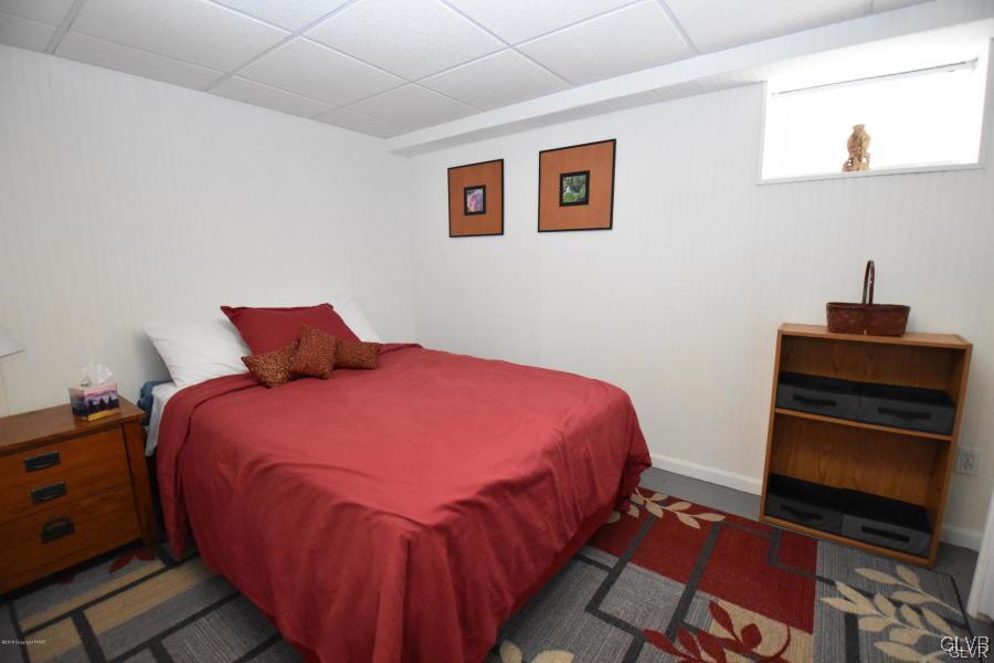 144 Indian Trail Road Jim Thorpe, PA 18229 - Photo 24 of 46 a bedroom with a bed and a desk