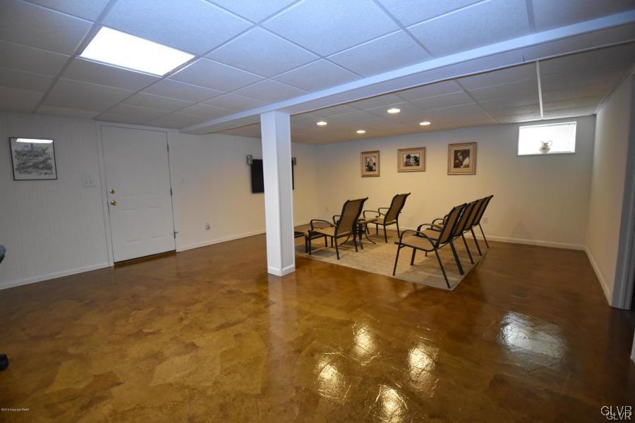 144 Indian Trail Road Jim Thorpe, PA 18229 - Photo 27 of 46 a view of a dining room with furniture and wooden floor