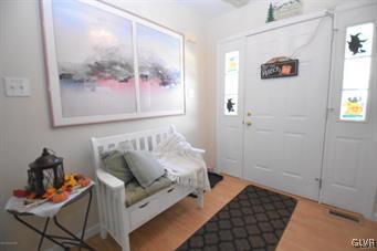 144 Indian Trail Road Jim Thorpe, PA 18229 - Photo 3 of 46 a bedroom with a bed and furniture