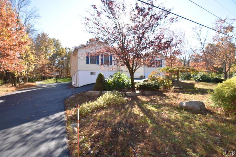144 Indian Trail Road Jim Thorpe, PA 18229 - Photo 34 of 46 a view of a house with a yard