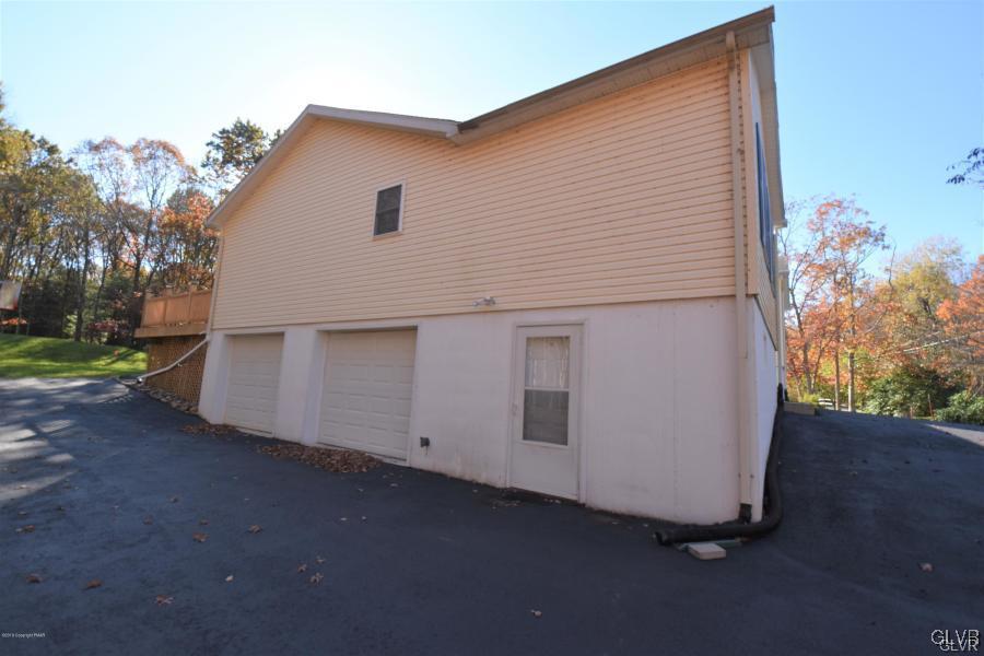 144 Indian Trail Road Jim Thorpe, PA 18229 - Photo 35 of 46 a view of a house with backyard