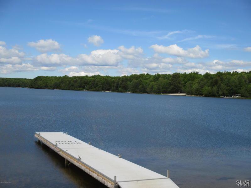 144 Indian Trail Road Jim Thorpe, PA 18229 - Photo 40 of 46 a view of a lake with mountain in the background