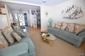 144 Indian Trail Road Jim Thorpe, PA 18229 - Photo 4 of 46 a living room with furniture and wooden floor