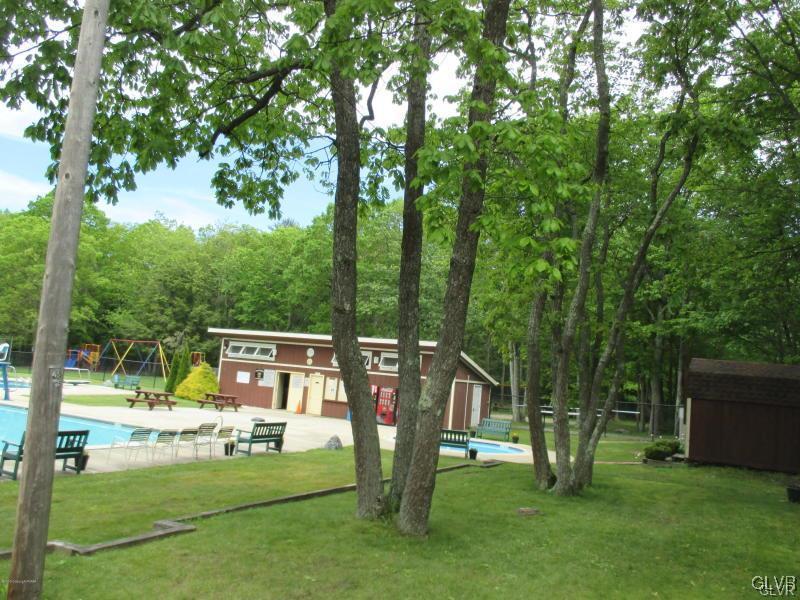 144 Indian Trail Road Jim Thorpe, PA 18229 - Photo 45 of 46 a view of a house with a backyard porch and sitting area