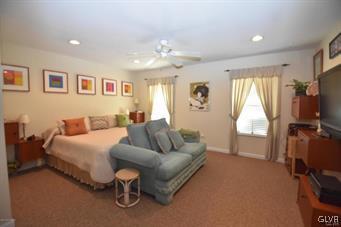 144 Indian Trail Road Jim Thorpe, PA 18229 - Photo 10 of 46 a living room with furniture and a flat screen tv