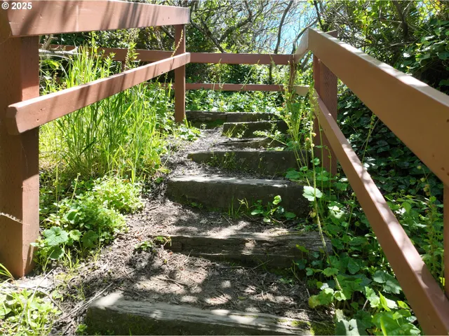 a view of swimming pool from a balcony