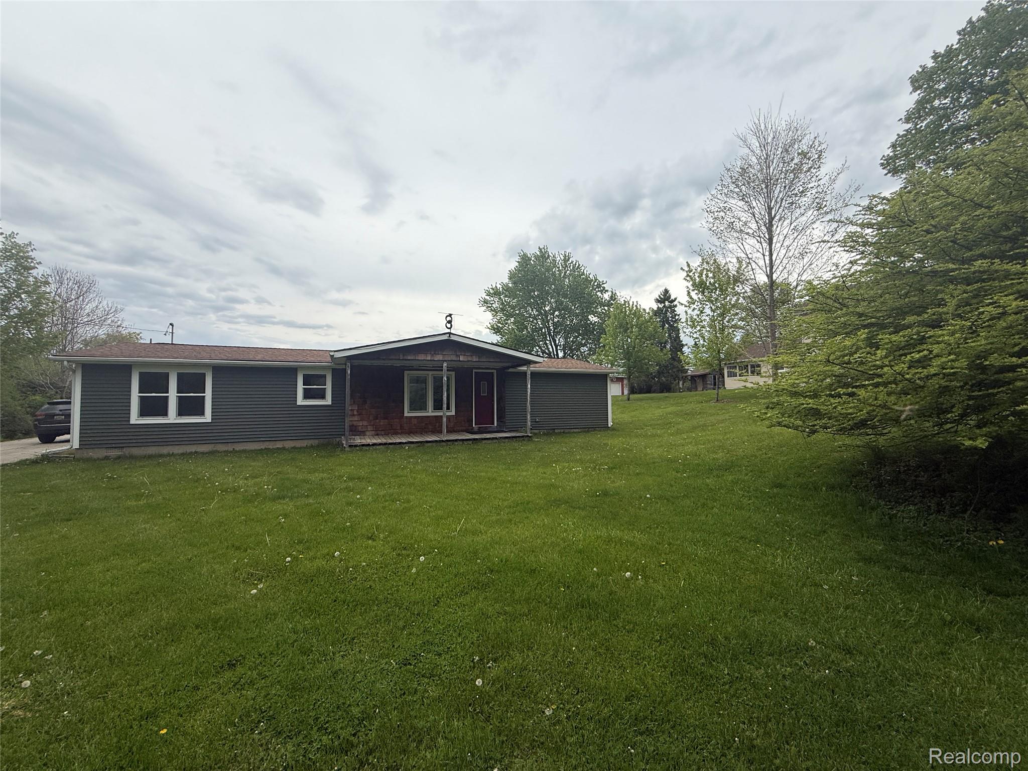7149-7163 Burpee Road Grand Blanc, MI 48439 - Photo 33 of 72 Back of property with a yard