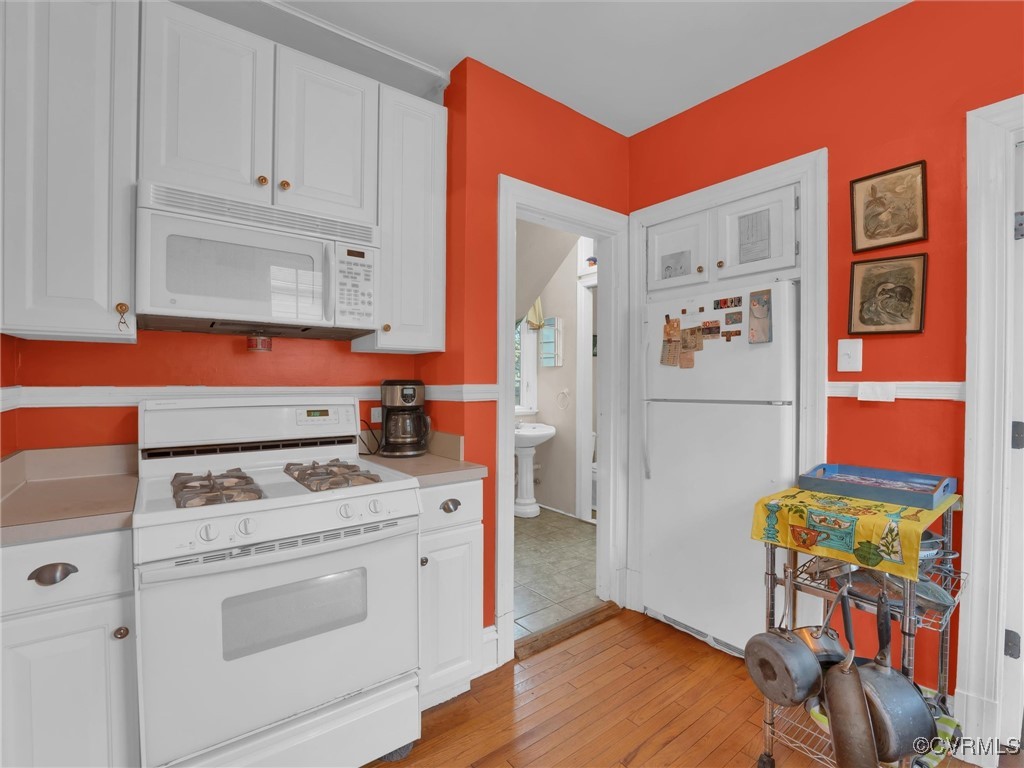 4402 Brook Road Richmond, VA 23227 - Photo 13 of 40 Kitchen featuring light hardwood / wood-style floo