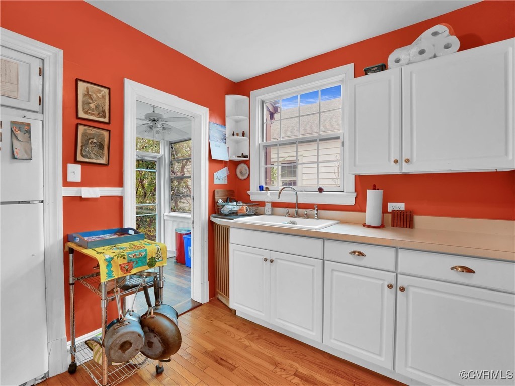 4402 Brook Road Richmond, VA 23227 - Photo 14 of 40 Kitchen with ceiling fan, sink, white refrigerator
