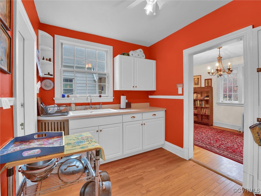 4402 Brook Road Richmond, VA 23227 - Photo 15 of 40 Kitchen featuring ceiling fan with notable chandel