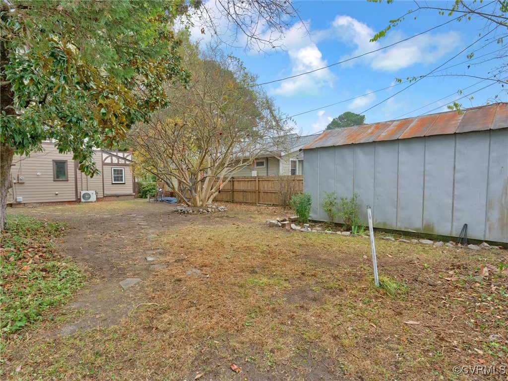 4402 Brook Road Richmond, VA 23227 - Photo 35 of 40 View of yard featuring a shed