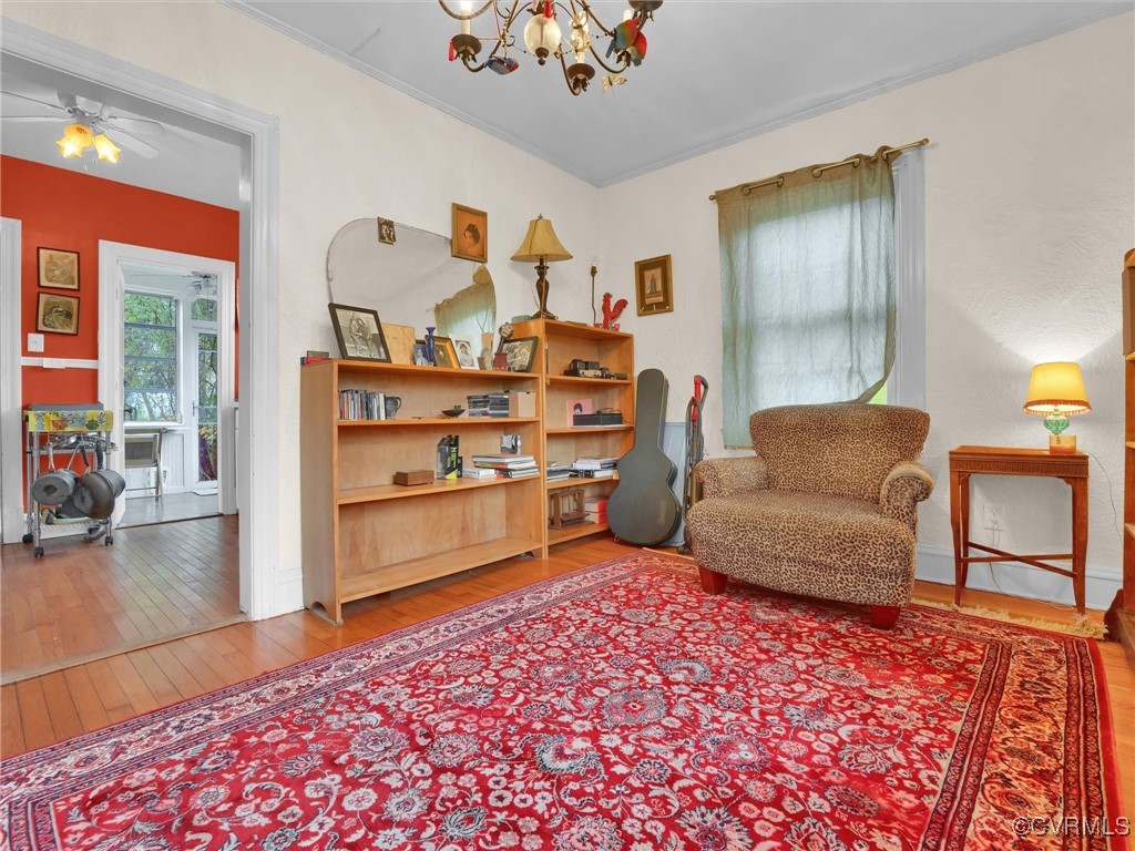 4402 Brook Road Richmond, VA 23227 - Photo 9 of 40 Living area with ceiling fan with notable chandeli