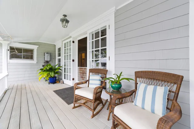 a view of a bathroom with a sink and mirror