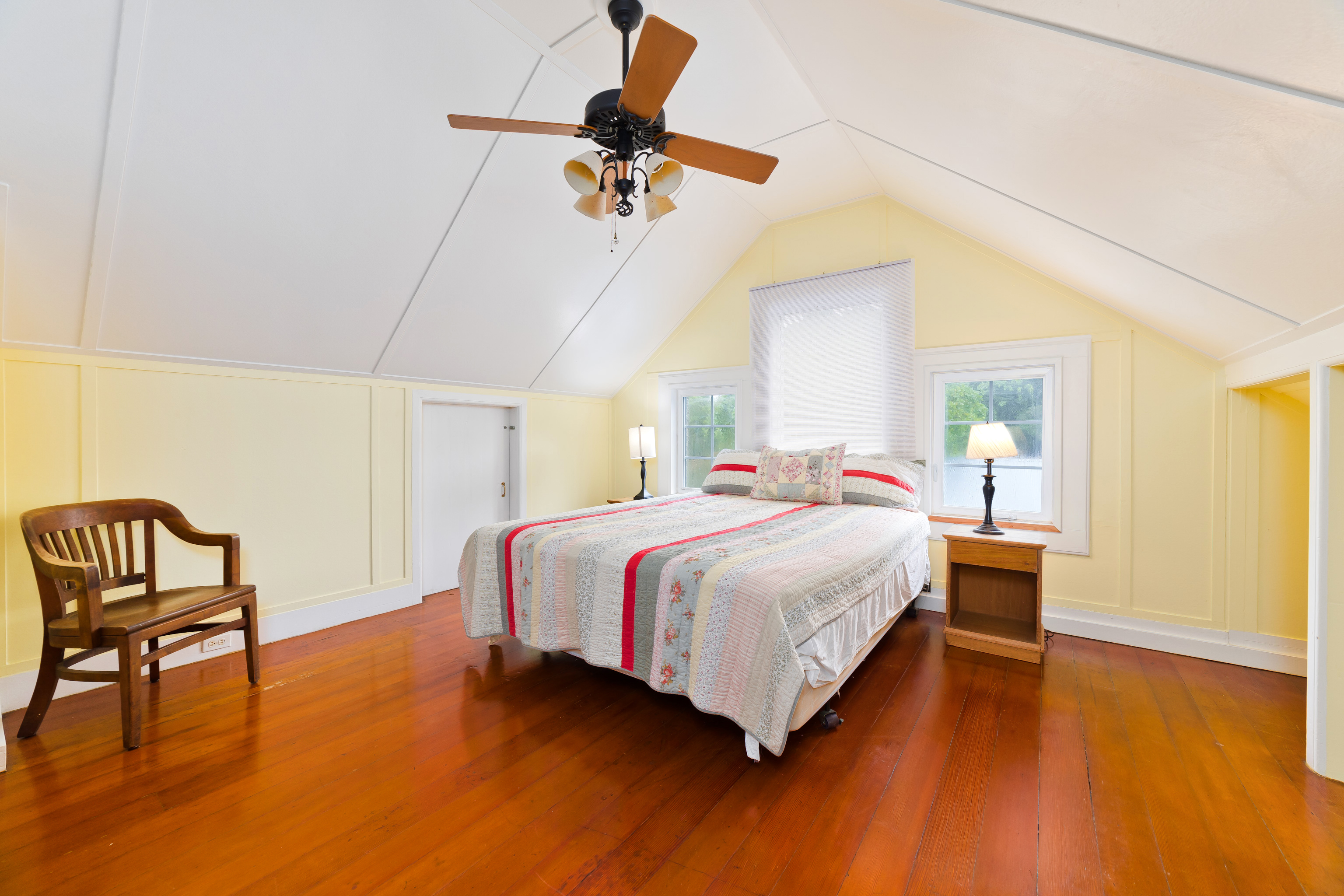 54-333 Union Mill Road Kapaau, HI 96755 - Photo 22 of 30 a bedroom with a bed and a chair