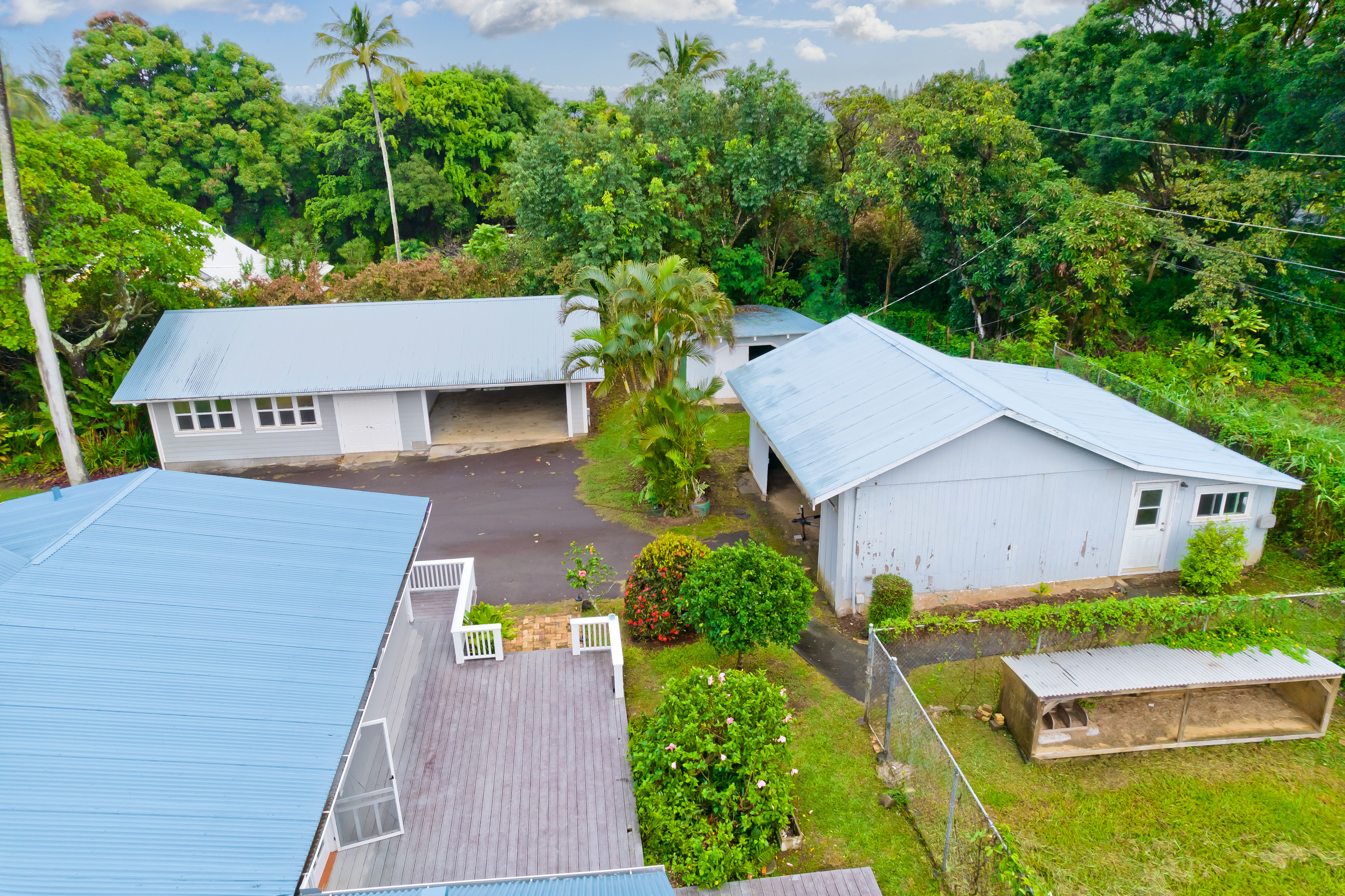 54-333 Union Mill Road Kapaau, HI 96755 - Photo 26 of 30 an aerial view of a house with swimming pool and garden