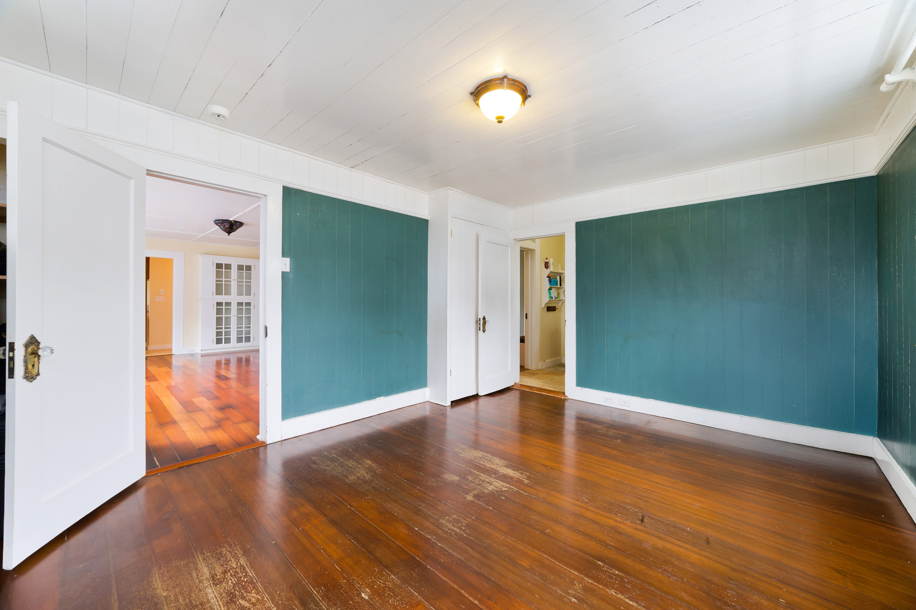 54-333 Union Mill Road Kapaau, HI 96755 - Photo 10 of 30 wooden floor in an empty room with a window