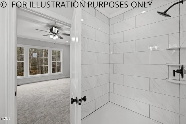 a backyard of a house with lots of green space and lake view