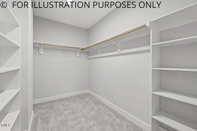 a view of a swimming pool with a lawn chairs under an umbrella