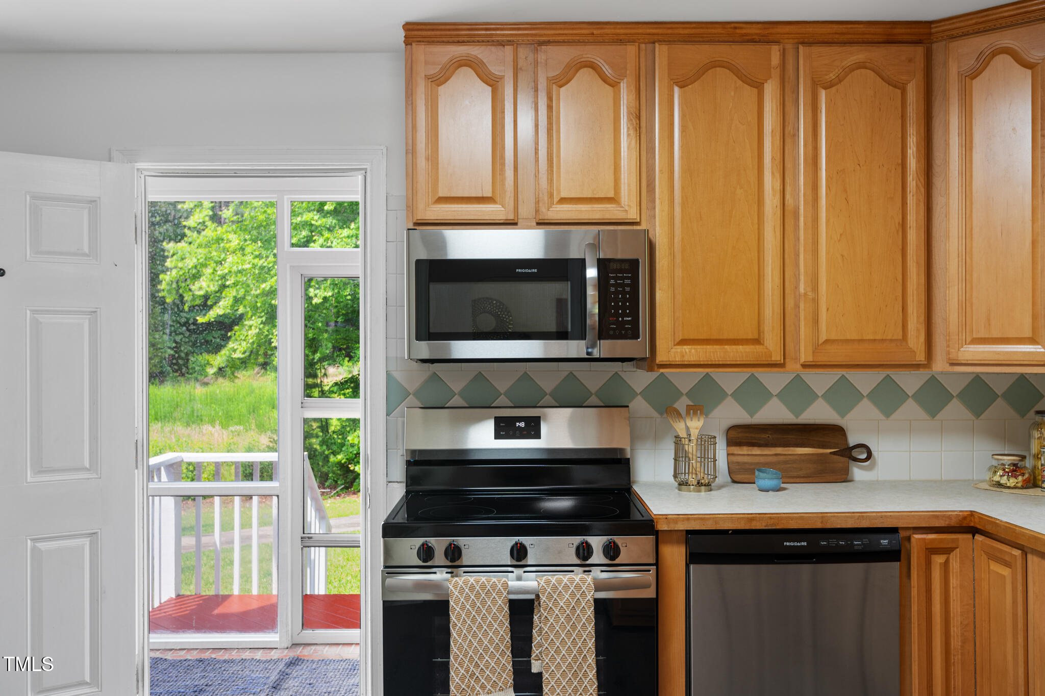 4703 Pleasant Green Road Durham, NC 27705 - Photo 14 of 56 Enclosed Entry Porch Opens Into Kitchen