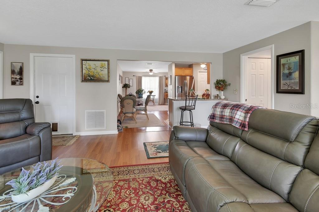 50 Bonita Road DeBary, FL 32713 - Photo 15 of 43 a living room with furniture and wooden floor