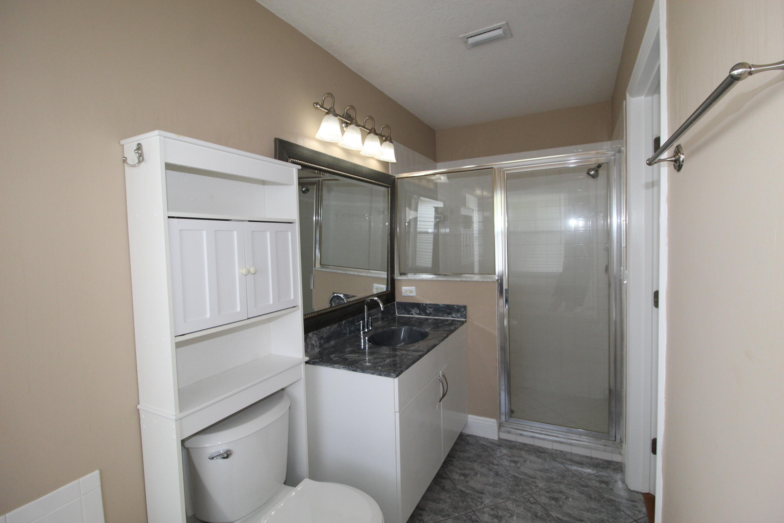 212 Southwest Ridgecrest Drive Port St. Lucie, FL 34953 - Photo 13 of 18 ensuite