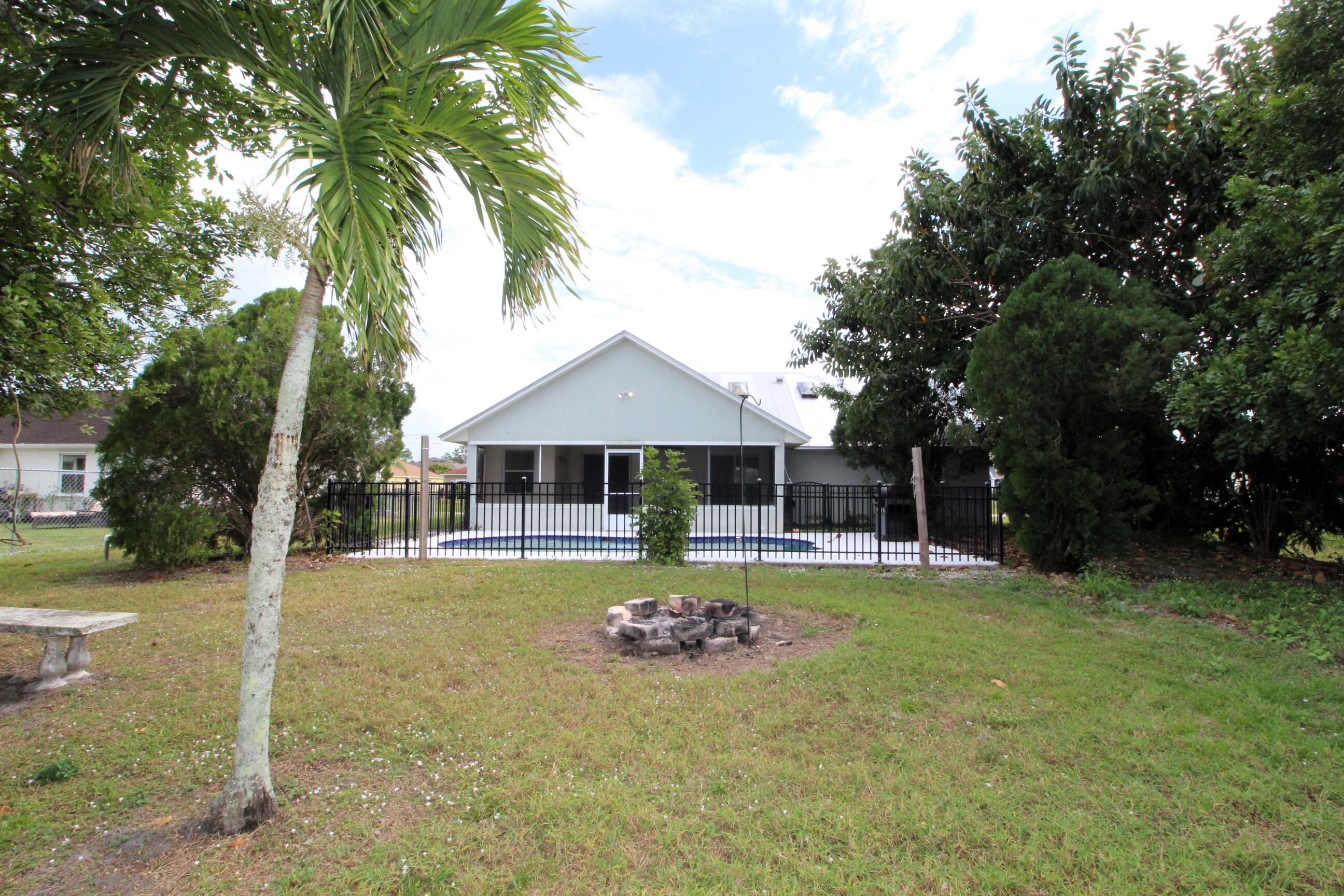 212 Southwest Ridgecrest Drive Port St. Lucie, FL 34953 - Photo 18 of 18 back yard