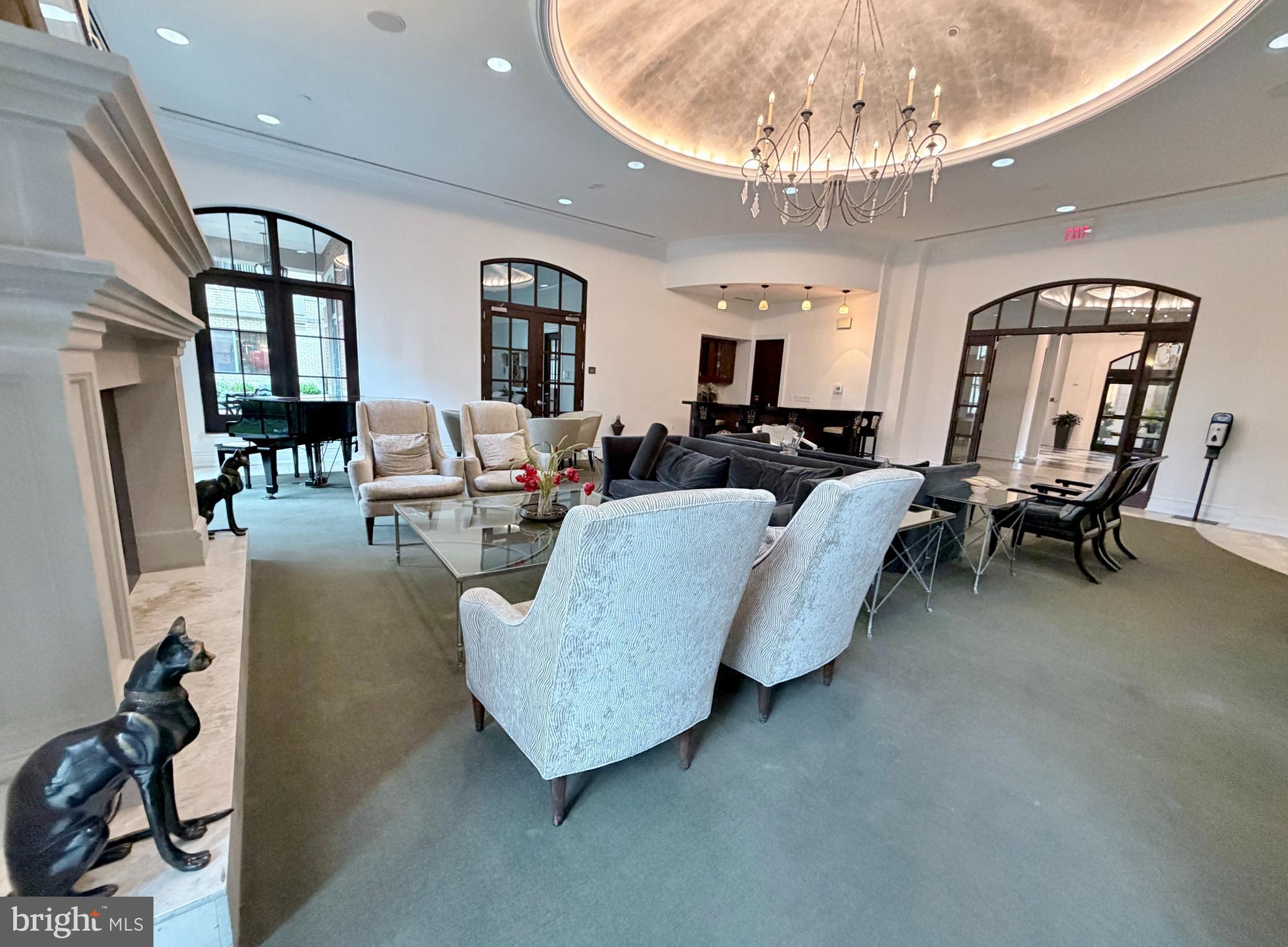 11710 Old Georgetown Road, Unit 429 North Bethesda, MD 20852 - Photo 24 of 40 a living room with furniture and a chandelier