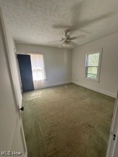 870 Helmsdale Road Cleveland Heights, OH 44112 - Photo 10 of 20 Unfurnished bedroom with carpet, multiple windows, and a ceiling fan