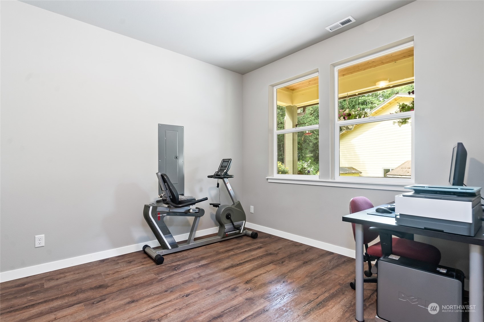 7101 Vandermark Road East Bonney Lake, WA 98391 - Photo 12 of 39 a view of a workspace with furniture and a window